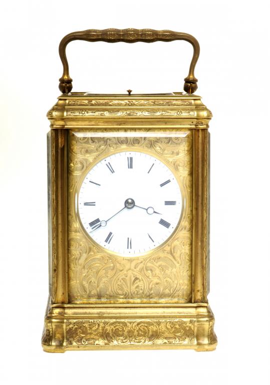 A FRENCH GILT BRASS CARRIAGE CLOCK with enamel dial and Breguet hands, bell striking movement with