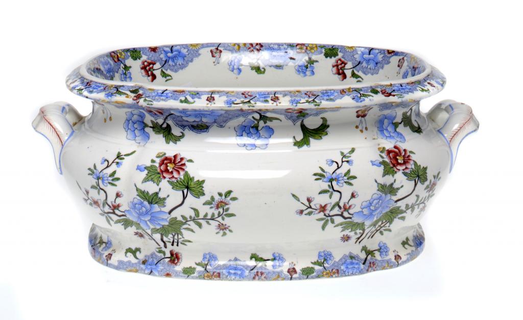 A COPELAND & GARRETT BLUE PRINTED EARTHENWARE FOOT BATH with flower sprays and borders picked out in