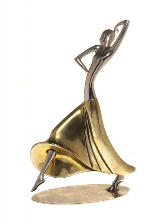 A HAGENHAUER BRASS FIGURE OF A DANCER on oval base, 29cm h, stamped circular mark and HAGENHAUER