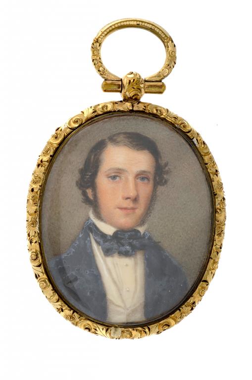 ENGLISH SCHOOL, C1840 A GENTLEMAN with curly black hair in black coat and cravat, ivory, oval, 44