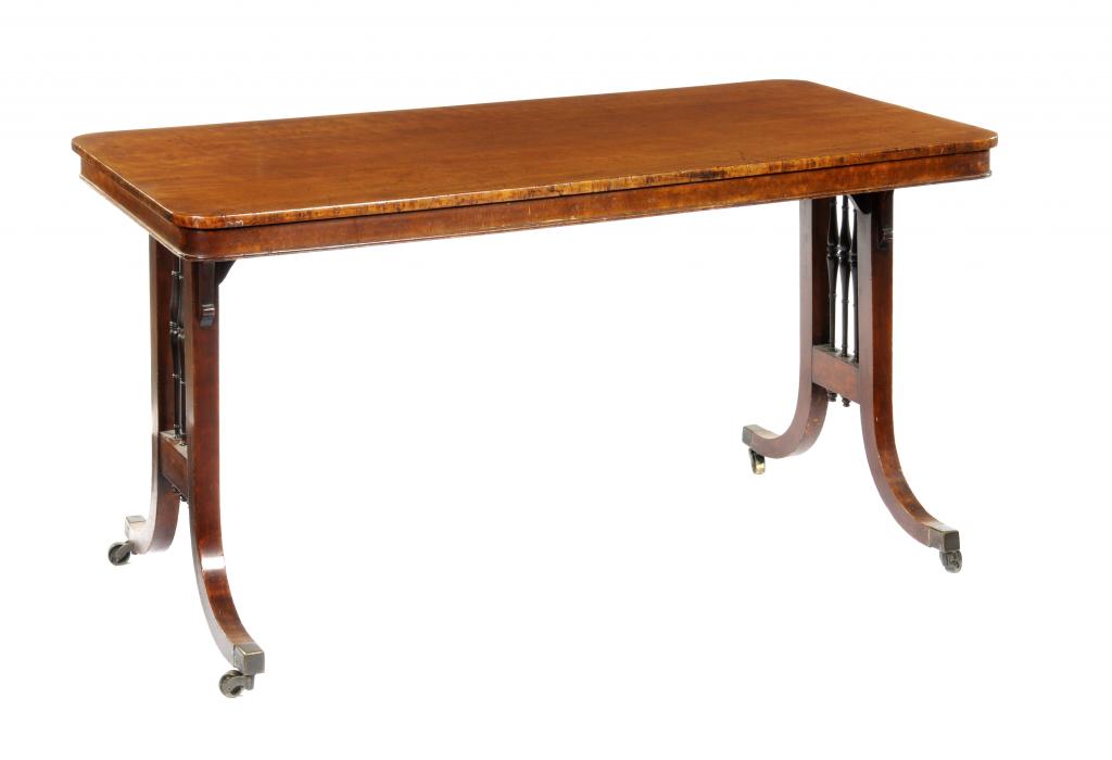 A GEORGE IV MAHOGANY TABLE the oblong top on triple spindle trestles and brass castors, 72cm h; 70 x