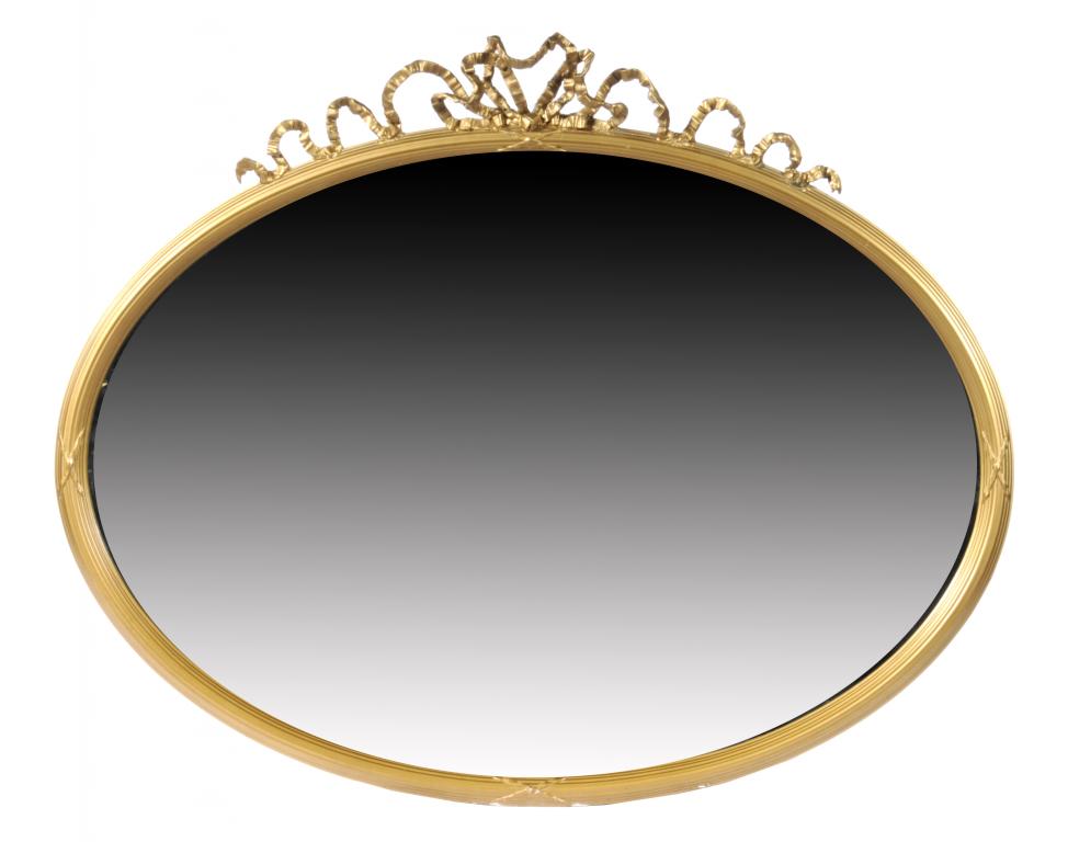 A NEO CLASSICAL STYLE GILTWOOD AND COMPOSITION OVAL MIRROR  the bevelled plate in reeded frame