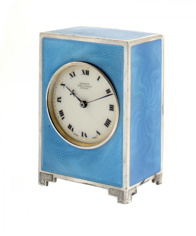 A CONTINENTAL SILVER AND BLUE GUILLOCHE ENAMEL MINIATURE TIMEPIECE  the Swiss movement with blued