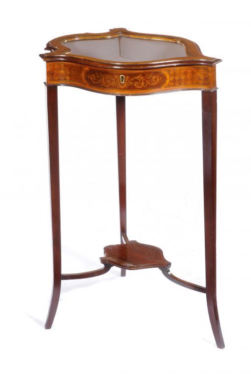 AN EDWARD VII MAHOGANY, PARQUETRY AND PENWORK DISPLAY TABLE of shield shape, the frieze with