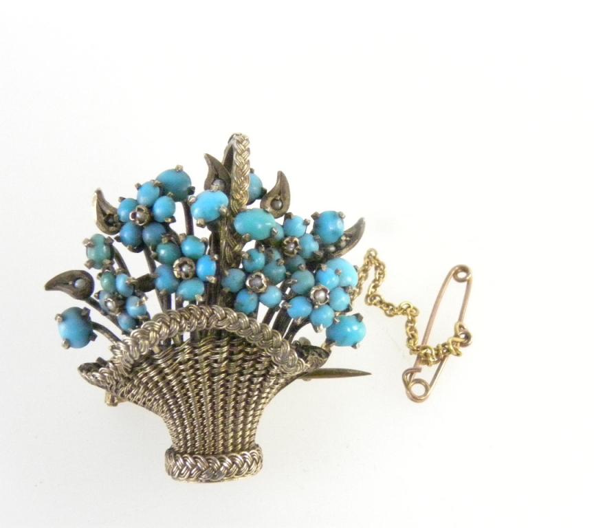 A TURQUOISE AND SEED PEARL SET SILVER GILT FLOWER BASKET BROOCH C1900