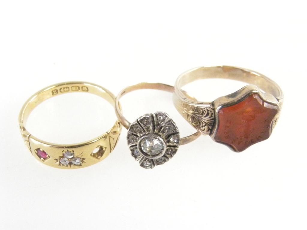 A VICTORIAN RUBY AND DIAMOND GYPSY SET 18CT GOLD RING, BIRMINGHAM 1899, LACKING ONE RUBY, A