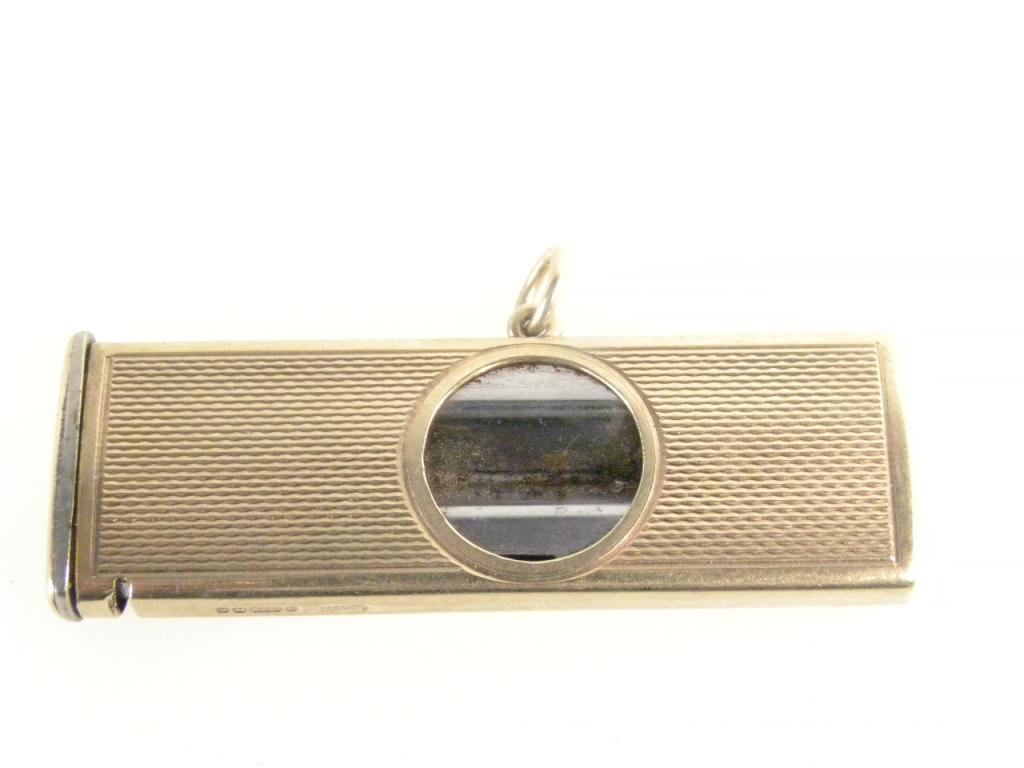 A 9CT GOLD SLEEVED CIGAR CUTTER, BIRMINGHAM 1966