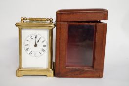 A early 20th century cased carriage clock with an 8 day movement