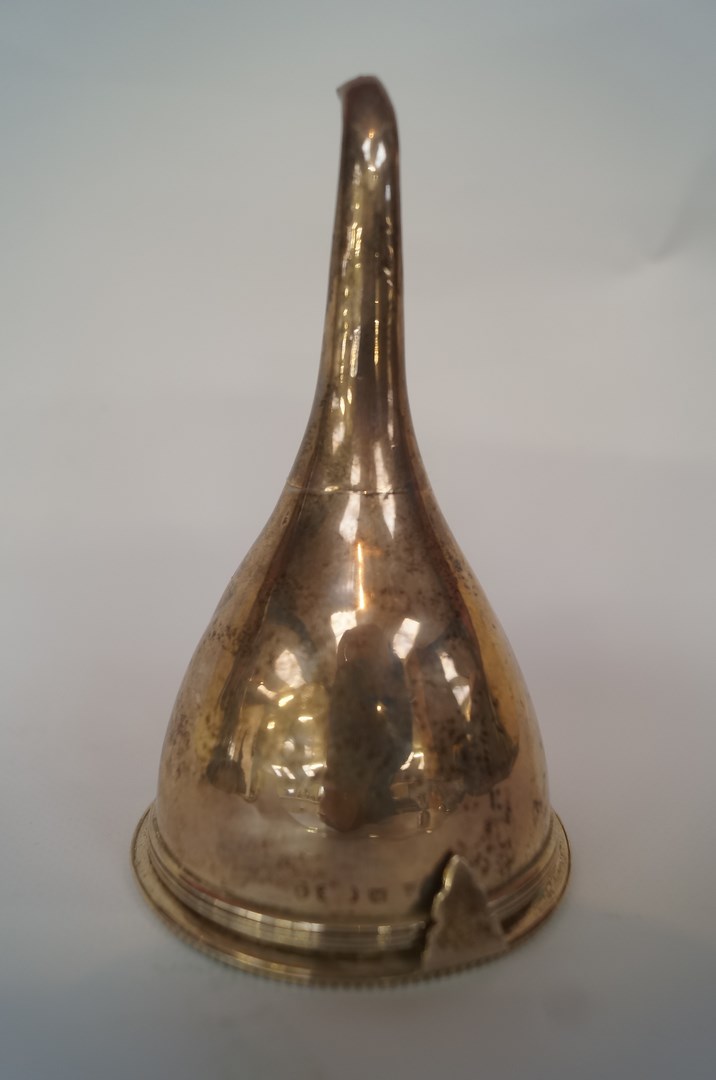 A Georgian silver wine funnel, by Peter, Anne and William Bateman, London 1800; with a beaded rim