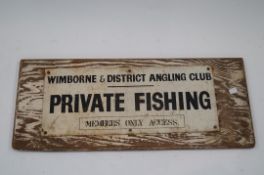 Vintage metal on wood Wimborne and district angling club sign