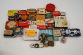 A collection of various tobacco tins