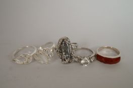 A collection of five rings, stamped '925; and stone set