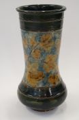 A large late 19th century Royal Doulton vase decorated with maple leaves
