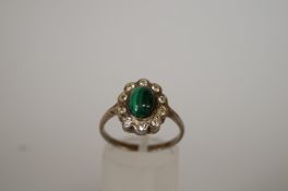 A malachite and paste cluster ring