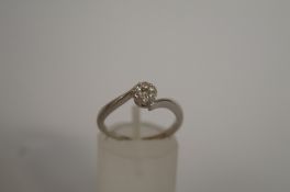 A seven stone diamond 9ct white gold cluster ring, totalling approximately 0.15cts, finger size M