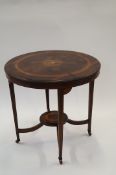 An Edwardian rosewood veneer circular inlaid table