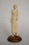 An early 20th century Ivory figure of a man
