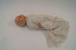 Early 20th century dressed doll