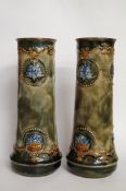 A pair of Royal Doulton stoneware vases, pattern number 5436, initialled CA