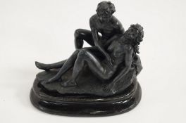 A bronzed model of lovers