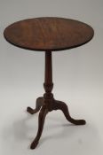 An early 19th century mahogany tilt table