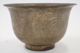 An oriental brass bowl with seal mark to the base