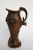 An Art Nouveau bronze jug
