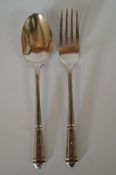 A silver teaspoon and fork set London 1948, AMB Monogram, approximately 39 grams gross
