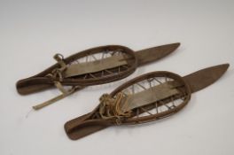 A pair of WW2 army snow shoes, stamped "1942 J.C.L. Ltd"