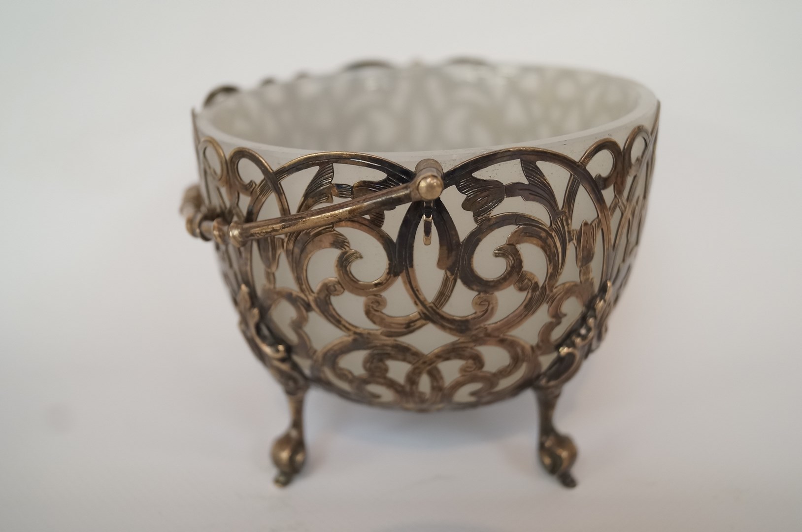A Victorian silver swing handled sugar basket by Cartwright, Hirons and Woodward Birmingham 1858,