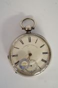 A silver open faced pocket watch, Birmingham 1880, with a key wound movement, 5.4cm diameter