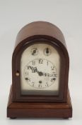 Arched wood case mechanical clock with chime and strike