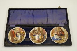 Three Victorian 'Cries of London' pot lids housed in a case