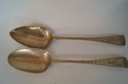 A George III Exeter silver bright cut table spoon, by Richard Ferris, 1810, and another similar by