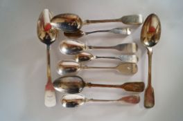 A collection of Antique Irish silver flatware comprising four tea spoons and five condiment spoons;