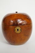 An 18th/19th century fruit wood tea caddy, in the form of an apple, hinged lid, with a stalk and