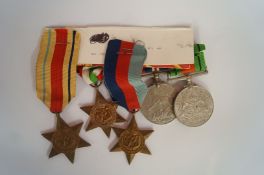 Africa star, France and Germany star, 1939-45 star, war medal and defence medal - all unnamed