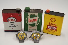 Two old AA badges, three old oil cans  - Esso, Castrol, Shell