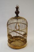 An early 20th century brass birdcage