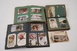 A collection of various postcards, many with local interest