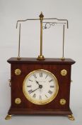 A reproduction "flying pendulum clock"