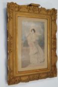 A gilt framed print of a lady