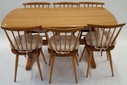 Ercol refectory table and six chairs with cushions