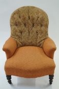 A Victorian button back chair