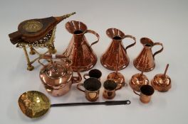 A good collection of copper items including kettle on stand, 19th century tankards, etc