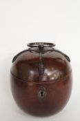 A George III fruit wood caddy of oval form, with steel handle, mounts and escutcheon, with key