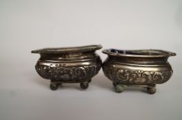 A pair of silver salts, maker C. H., Birmingham 1899, of rectangular outline, with embossed