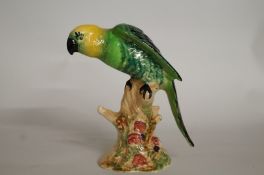 A Beswick figure of a  parakeet, the base marked "930"