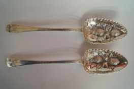 A pair of Georgian silver berry servers, by Joseph Hicks, Exeter 1806, with unusual decoration; 23cm