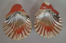 A pair of silver shell butter dishes by Howson Brothers and Howson (George Howson) Sheffield 1903,